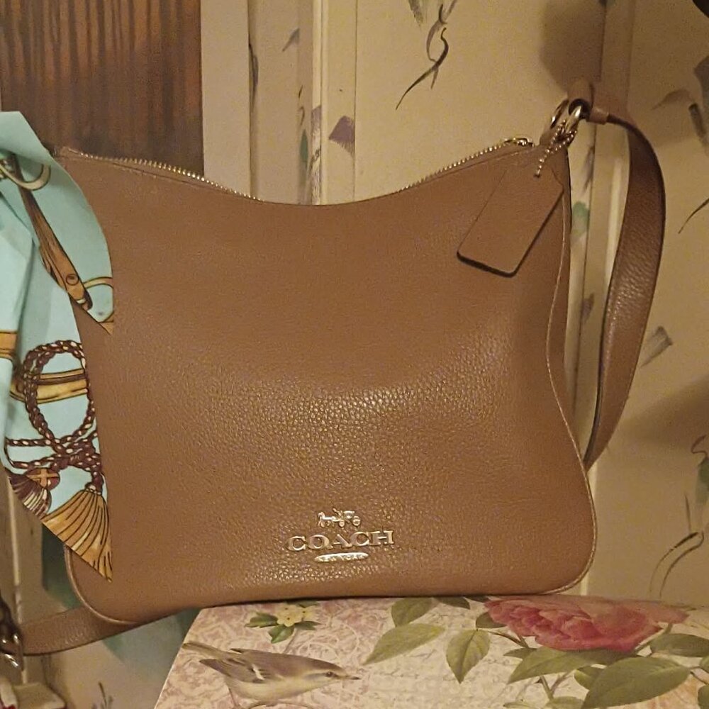 Coach Crossbody File Bag in tan leather.